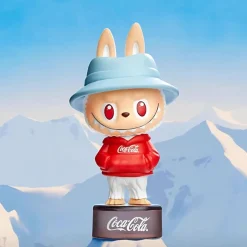 Boîte mystère Coca-Cola figurine type Labubu – The monsters