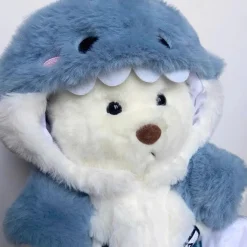 Ours en peluche déguisé en requin