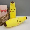 Peluche banane sourire jaune fruit doux câlin enfant