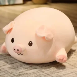 Peluche cochon allongé content