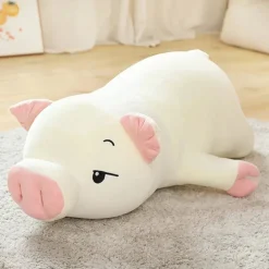 Peluche cochon allongé endormi