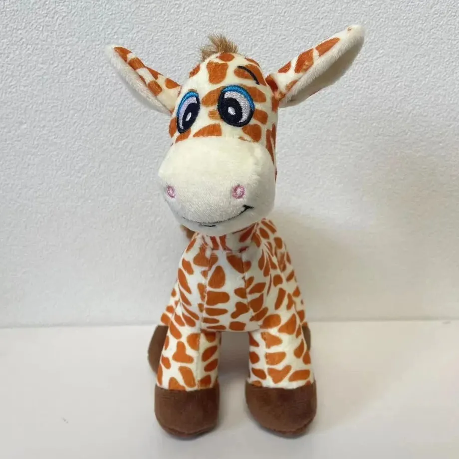 Peluche girafe aux gros yeux