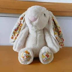 Peluche lapin doux oreilles fleuries printemps enfant