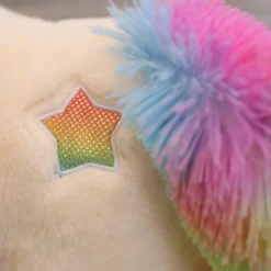 Peluche licorne avec des étoiles dans les yeux