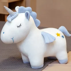 Peluche licorne coloré aux yeux fermés avec cornet argenté magiques