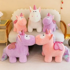 Peluche licorne coloré magique avec ailes pailletées