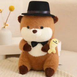 Peluche loutre avec un chapeau qui tient un poisson coloré