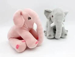 Peluche éléphant assis et content