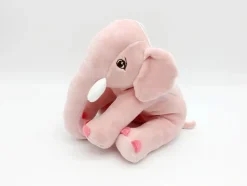 Peluche éléphant assis et content