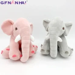 Peluche éléphant assis et content