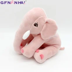 Peluche éléphant assis et content