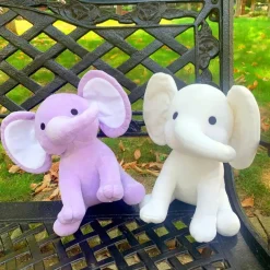 Peluche éléphant coloré avec sa trompe tordue