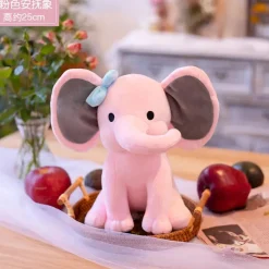 Peluche éléphant coloré avec sa trompe tordue