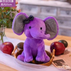 Peluche éléphant coloré avec sa trompe tordue