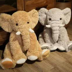 Peluche éléphant poilu aux petites défenses