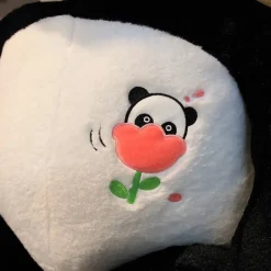 Peluche panda géant avec une fleur
