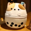 Peluche squishmallow chat dans un bol