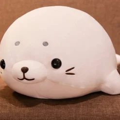 Peluche Squishmallow phoque blanc content