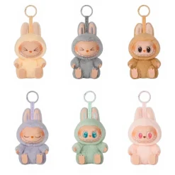 Peluche type Labubu assise boîte mystère