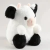 Peluche vache noire et blanche mignonne et douce