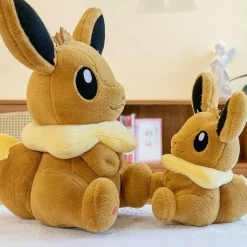 Peluche évoli pokémon assise toute douce